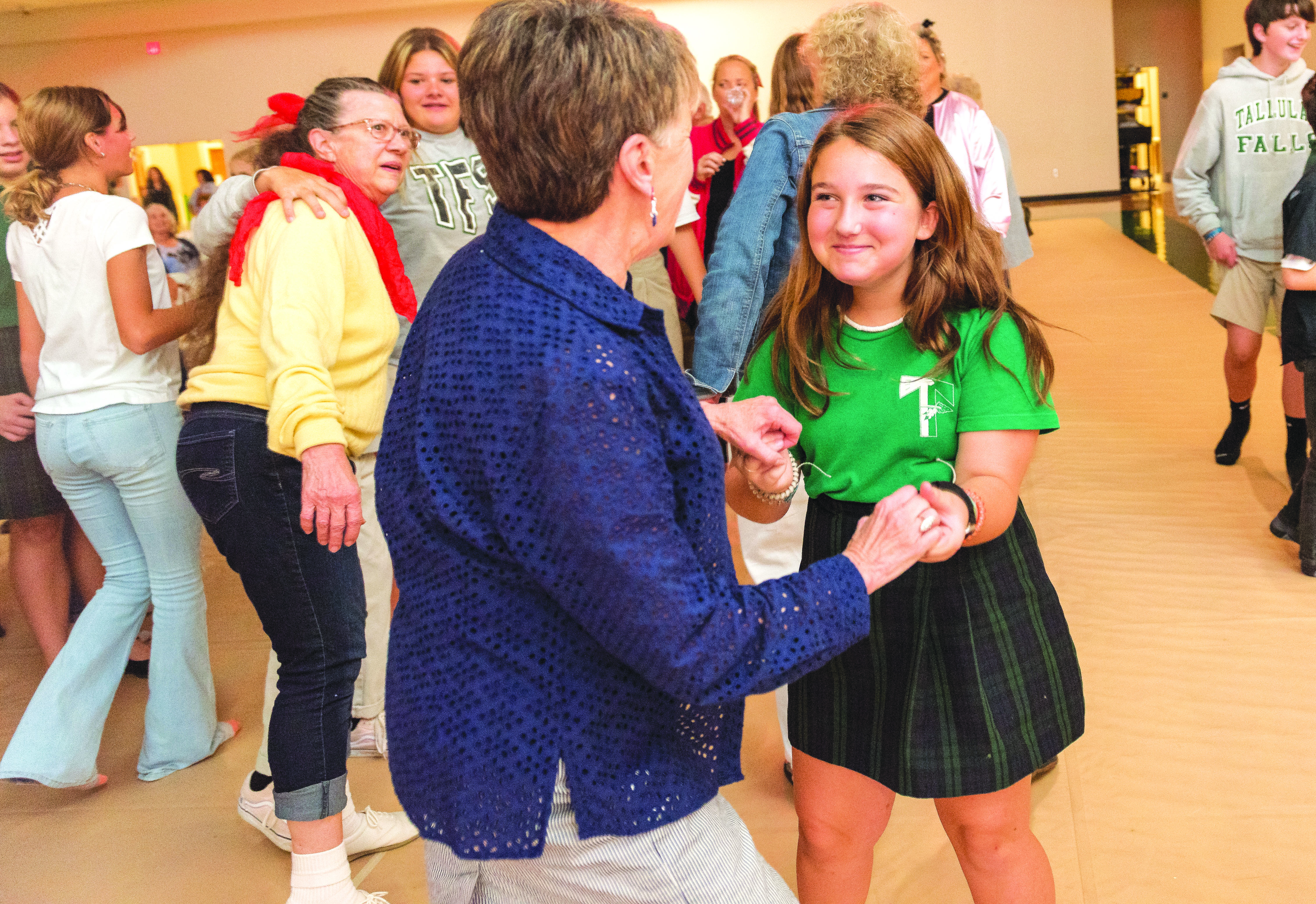 E. Lane Gresham/Tallulah Falls School. Tallulah Falls School recently hosted its Grand Day event at the middle school campus. A Oct. 7 dance featuring the Sock Hops proved popular with students and their guests. Shown (from left) Ginny Allison dances with granddaughter Ellie Shaw, a sixth-grader at Tallulah Falls School.