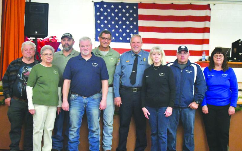 Megan Broome/The Clayton Tribune. Pictured are Jerry Robinson; Mayor Grace Watts; Council Member Eric McCrackin; Council Member Robert Sutton; Council Member Michael Holt; Police Chief Tom Garrison; City Clerk Brenda Cannon; Interim Police Chief Jeremy Welch; and Council Member Brenda Hooper. 