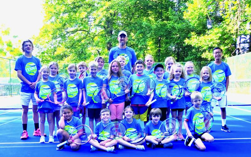 Photo courtesy Bryan Getty. Getty poses with the campers from the Summer Tennis Camp at Kingwood Resort. 