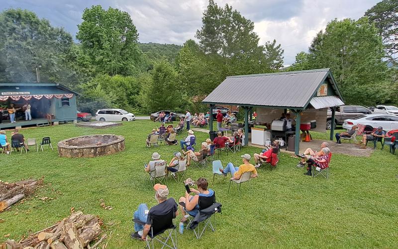 Megan Broome/The Clayton Tribune. Crowds of people attend the Saturday Night Bluegrass Jam in downtown Tallulah Falls July 1. The crowd enjoyed live bluegrass music and a cookout and celebrated Independence Day over the weekend. 