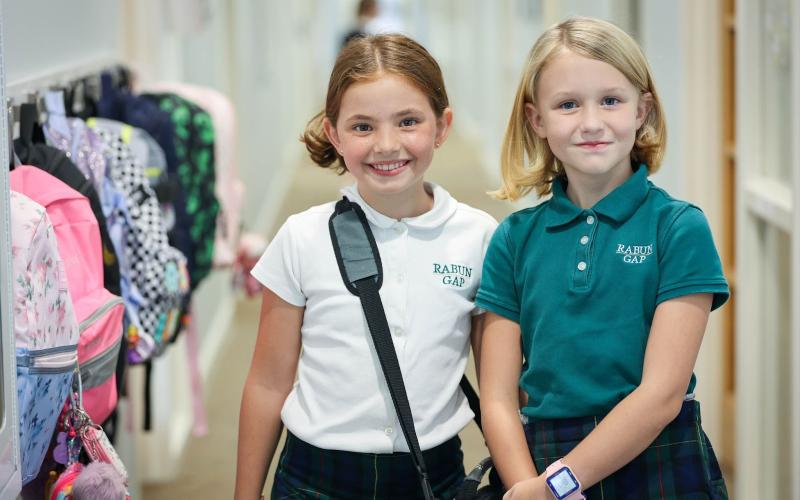 Photo courtesy Rabun Gap-Nacoochee School. Lillie Wood '32 of Clarkesville, GA, and Aaralyn Greer '32 of Long Creek, NC pose for a photo on the first day of school at Rabun Gap-Nacoochee School. Rabun Gap welcomed back 675 students on August 23.