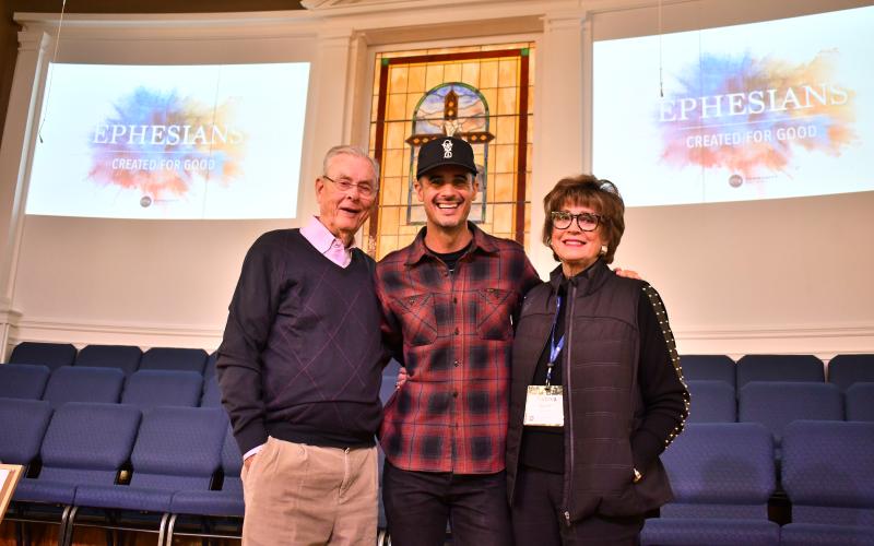 Megan Horn/The Clayton Tribune. Kristian Stanfill stands with grandparents Tom and Barbara Stanfill at Clayton Baptist Church after performing Oct. 10. Tom and Barbara are long-time Rabun County residents and Barbara is the Prayer Chair for Ladies’ Community Bible Study. 