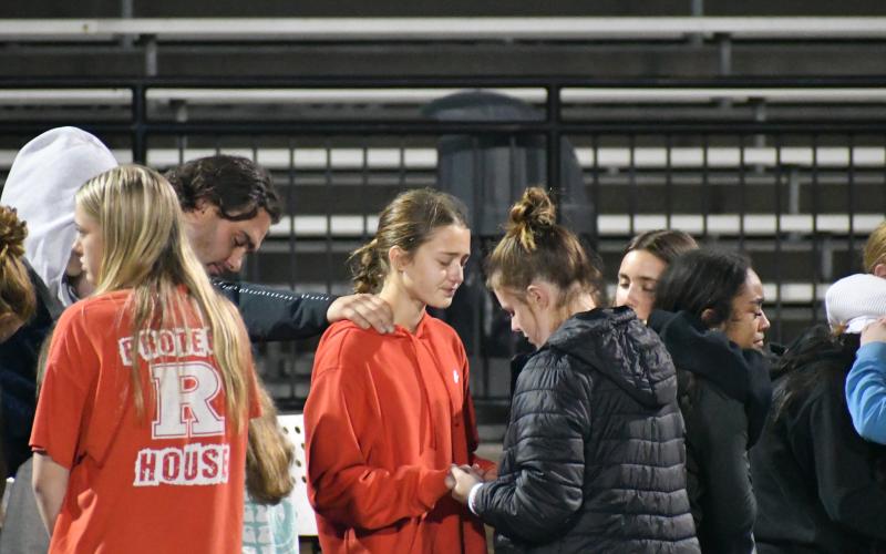 Wade Cheek/The Clayton Tribune. Rabun County middle and high school students join together for a time of prayer during the Oct. 25 “Fields of Faith” at Frank Snyder Memorial Stadium. This was the first time Rabun County and The Fellowship of Christian Athletes has hosted a “Fields of Faith” event.  