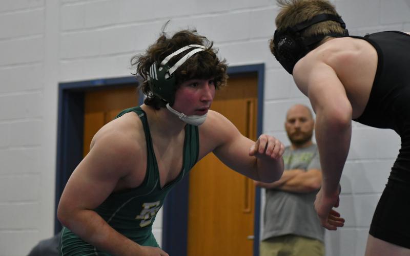 Wade Cheek/The Clayton Tribune. Rabun Gap's Clay Unruh sizes-up his Towns County opponent for an eventual takedown in this year's KOM Invitational.  