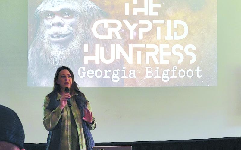 Enoch Autry/The Clayton Tribune. Jessica Jones, the Cryptid Huntress, speaks to the audience.
