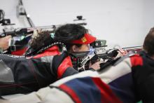 TFS Athletics. TFS senior marksman Brianna Walter lines up a shot during one of the TFS rifle team’s matches this past season. 