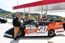 Megan Horn/The Clayton Tribune. Many local businesses sponsor Rabun County Fire Services Firefighter Jerry Buice while he races the season at Lavonia Speedway, Toccoa Raceway and in Murphy, N.C. The newest sponsor is Circle S. Pictured is Buice with his “Big Unit 50” race car in front of the Clayton business last weekend. 
