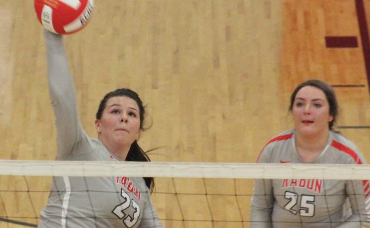 Destiny Deetz (23) attempts a kill while teammate Lyndee Hollifield (25) looks on during a match against Prince Avenue Christian at Ken Byrd Court in Tiger on Tuesday night. (Glendon Poe/The Clayton Tribune)