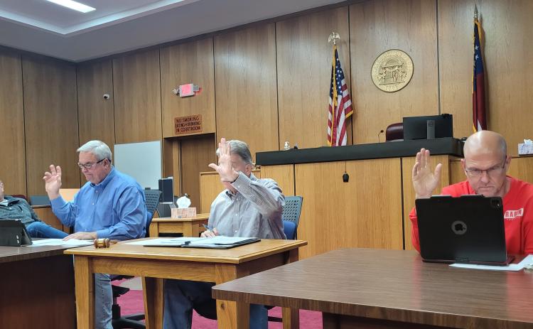 Megan Broome/The Clayton Tribune. Rabun County commissioners vote Tuesday to approve the first reading of an ordinance to allow campers and motorhomes on a property during construction. 