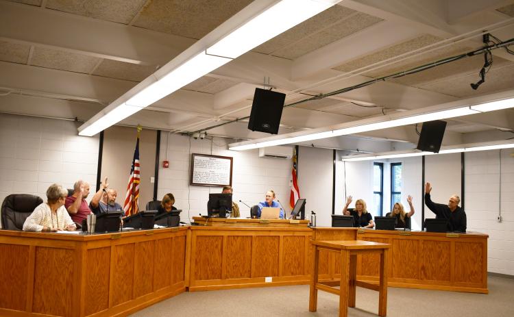 Megan Horn/The Clayton Tribune. Clayton City Council members voted unanimously to enter into an intergovernmental agreement with the RCWSA to consolidate water and sewer services.