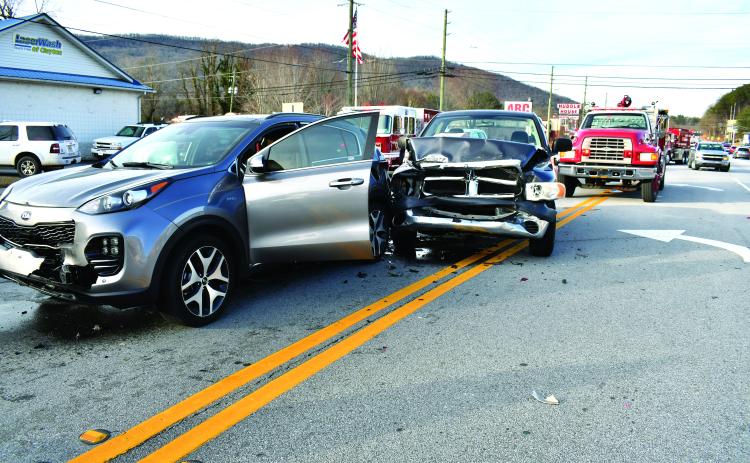 Megan Horn/The Clayton Tribune. Two of the vehicles involved in a five-vehicle crash on Dec. 21 remained in the middle of Highway 441 on Dec. 21 as first responders worked the scene. Minor injuries were reported and a Rabun County man was arrested following the crash. 