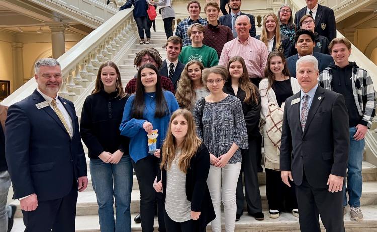 Submitted photo. The Forward Rabun Youth Leadership team and the government class from Rabun County High School traveled to the Georgia State Capitol recently. The groups are pictured with representatives Victor Anderson (GA-10) and Stan Gunter (GA-08) on the Capitol steps. 