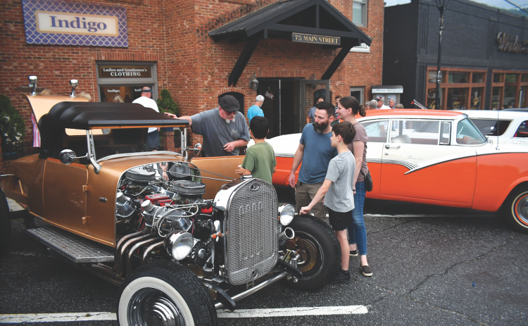 File photo/Enoch Autry/The Clayton Tribune. The August 2023 Clayton Downtown Block Party drew hundreds to Main Street to see classic cars, eat good food and have fun. On Saturday, March 16, another block party also will have a lot to offer.