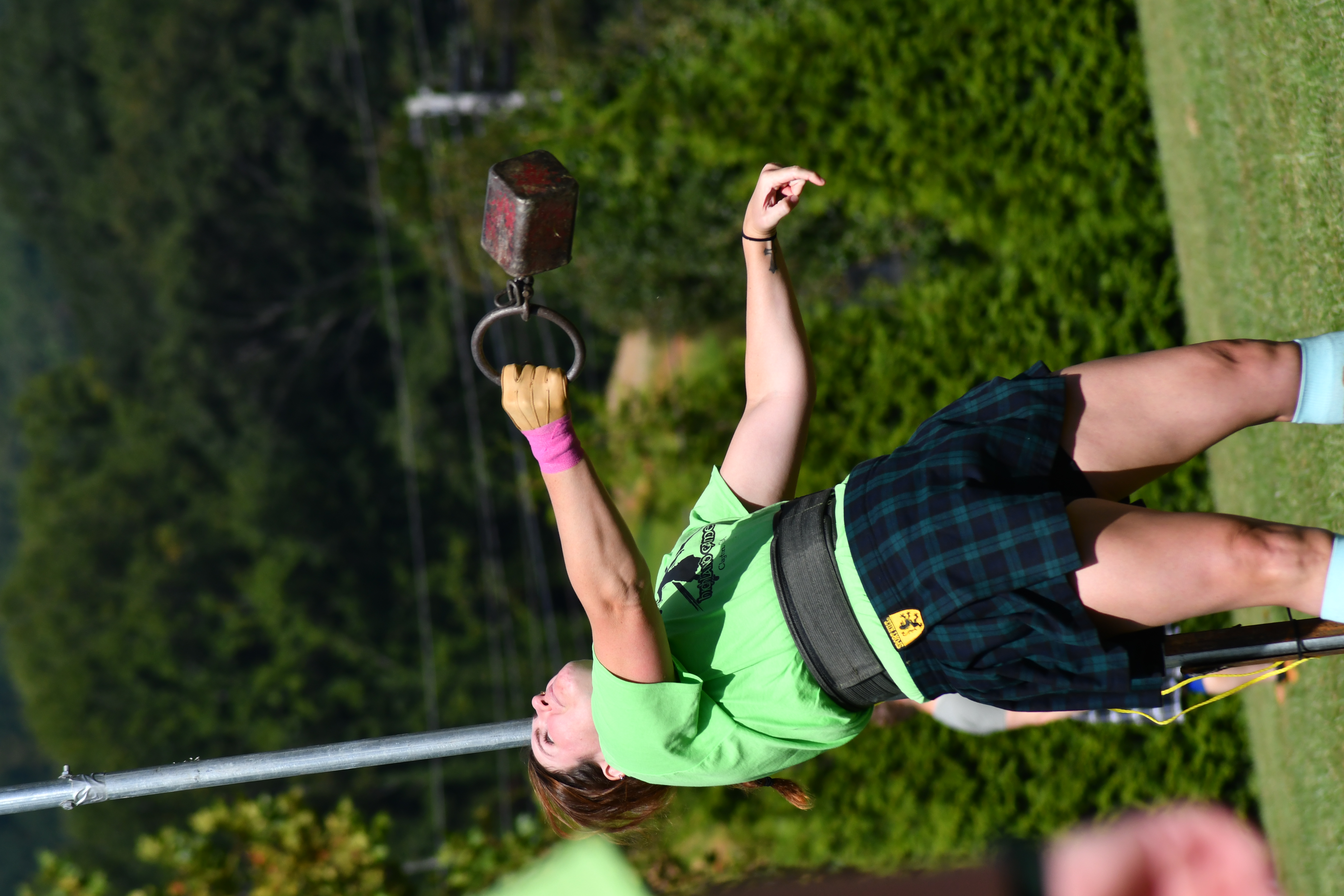Enoch Autry/The Clayton Tribune. Madison Weinreich sets a personal record in the stone put at the Sept. 24 North Georgia Highland Games at the county’s civic center.