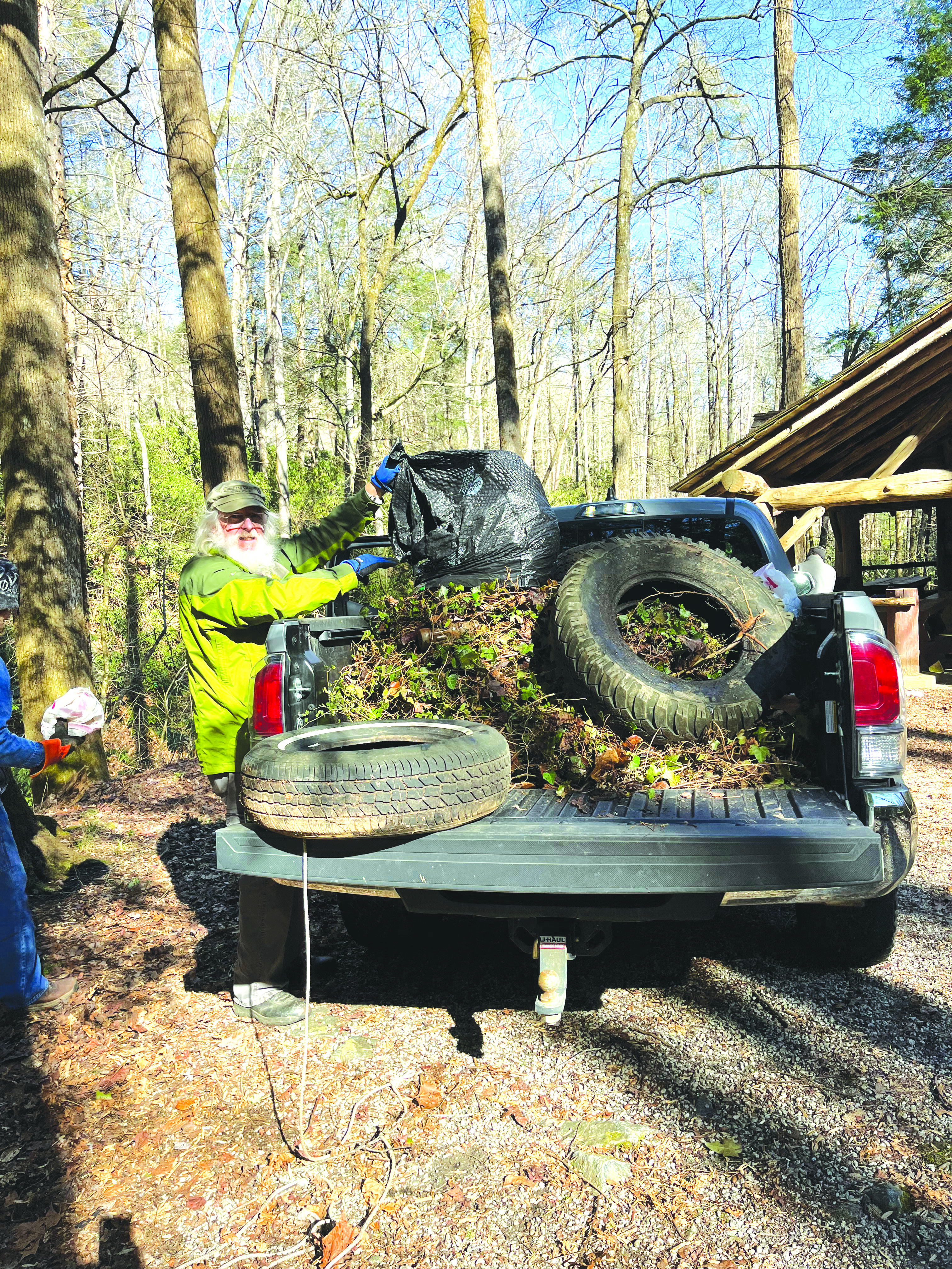 Submitted photo. Georgia ForestWatch Board members volunteer to remove 300 pounds of invasive plants and trash before many spring wildflowers emerge at the Warwoman Dell recreation area just outside Clayton. 