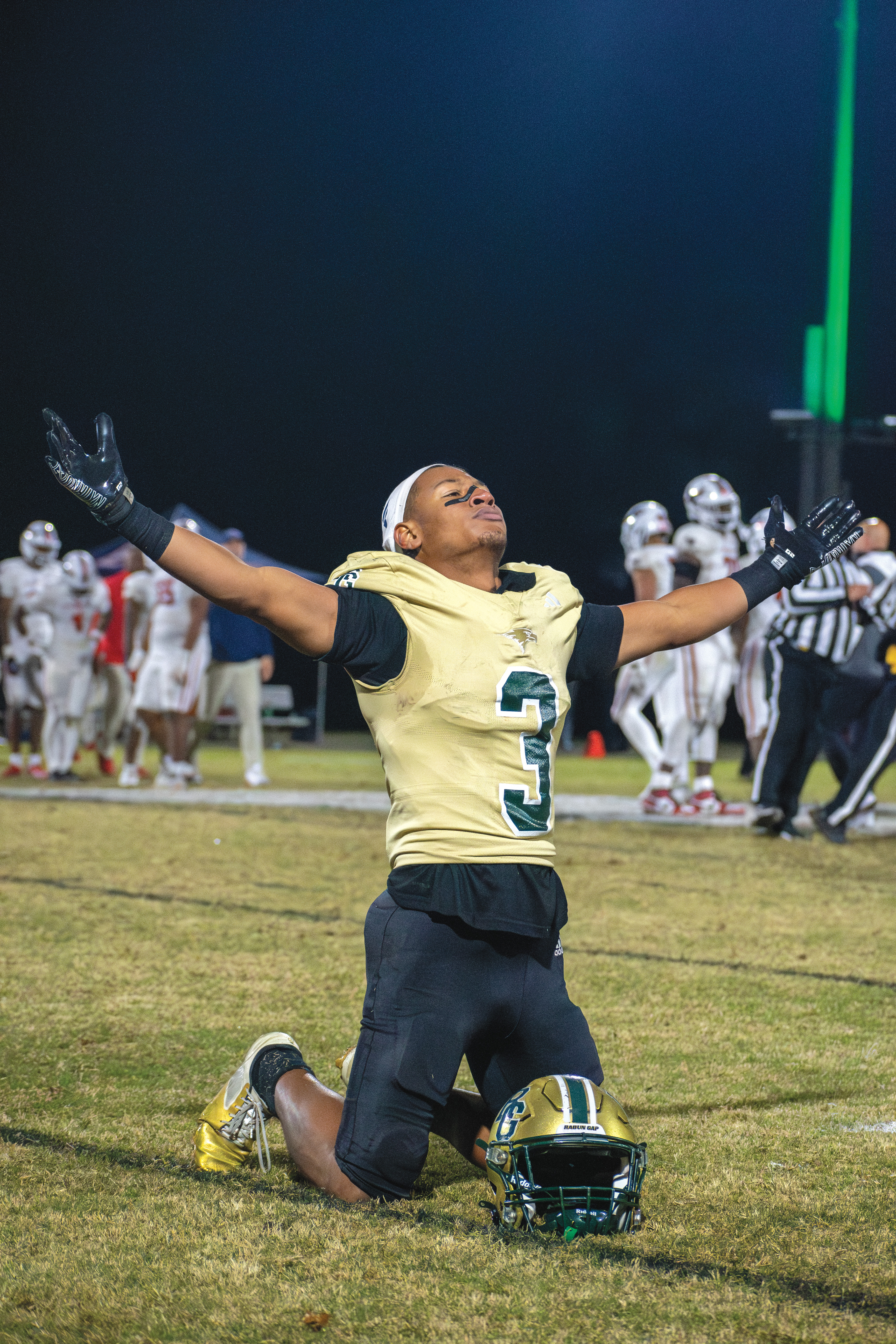 Wade Cheek/The Clayton Tribune. As time expires in last week’s NCISAA 4A State Title game between Rabun Gap and Providence Day, senior running back Anthony Quinn Jr. celebrates with joy and relief of the Eagles winning their first-ever football state title after prevailing 42-39 over the Chargers. 