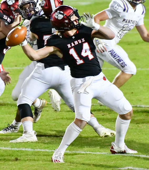 File Photo. Quarterback Gunner Stockton (14) as a Rabun County junior  prepares to release a deep throw the sideline to a Wildcats receiver.