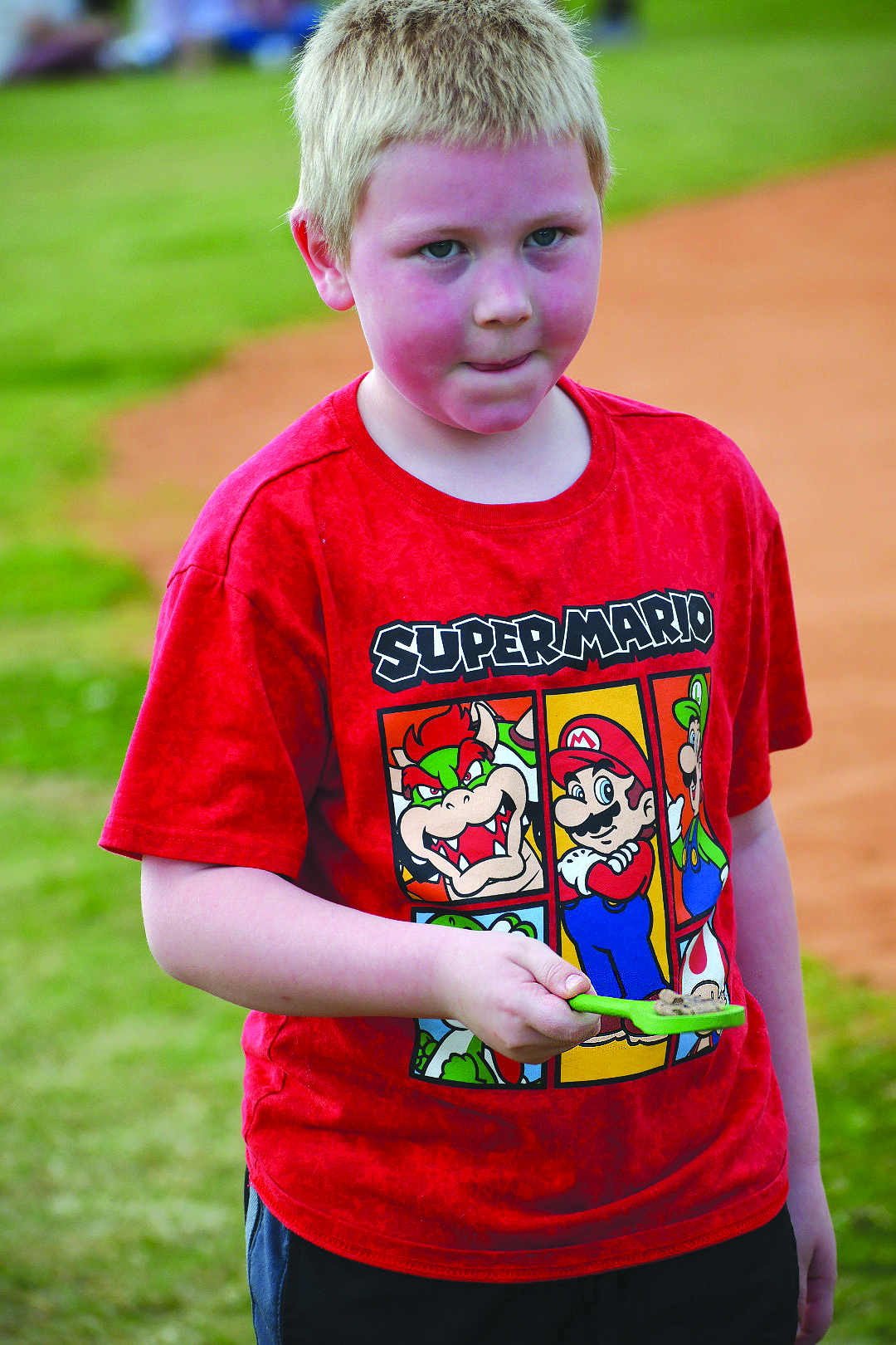 Enoch Autry/The Clayton Tribune. Zealand Fair, 6, concentrates as he finishes his pellet race at the April 2 Rabun County Recreation Department Easter Egg Hunt.
