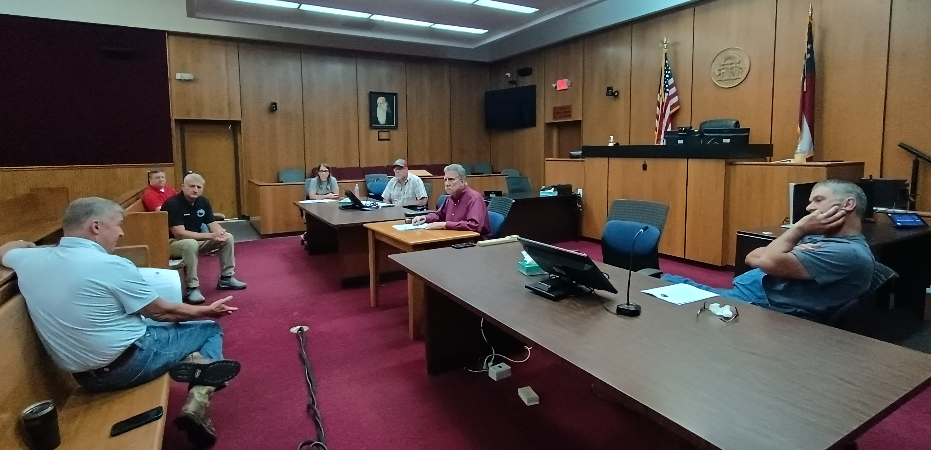 Megan Horn/The Clayton Tribune. Rabun County Attorney Allyn Stockton, left, speaks to Rabun County commissioners and officials during a special called meeting Aug. 21 about a letter received from Rabun County Water and Sewer (RCWSA) members about the City of Demorest's condemnation of Tallulah Falls property for a proposed Water Treatment Plant. 