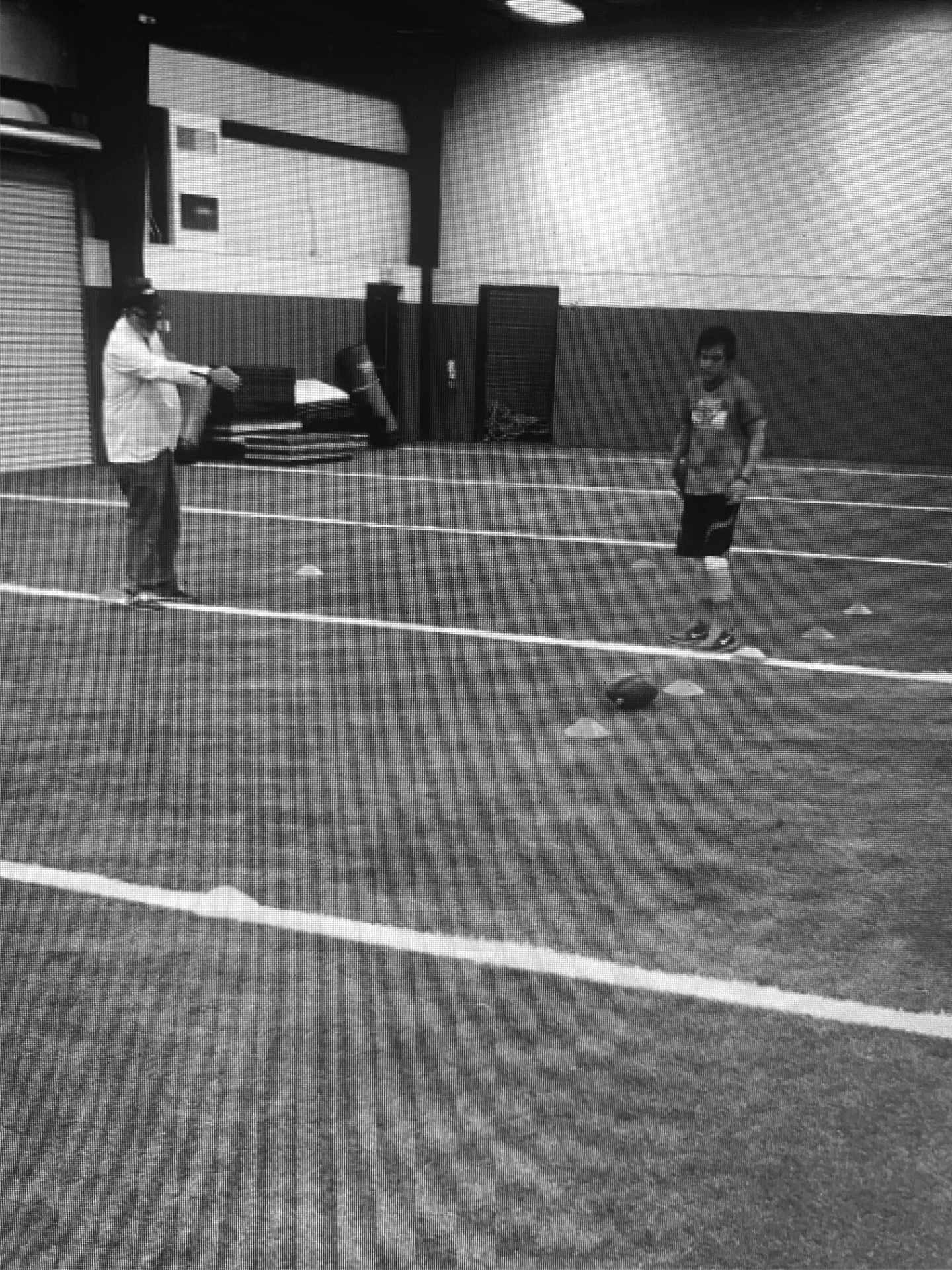 Photo courtesy of George Bobo. A young Gunner Stockton trains with George Bobo at the Rabun County High School indoor football facility. Bobo began working with Stockton when the quarterback was 6. Stockton, now a fifth-year senior at the University of Georgia, is preparing for his final season of college football. 