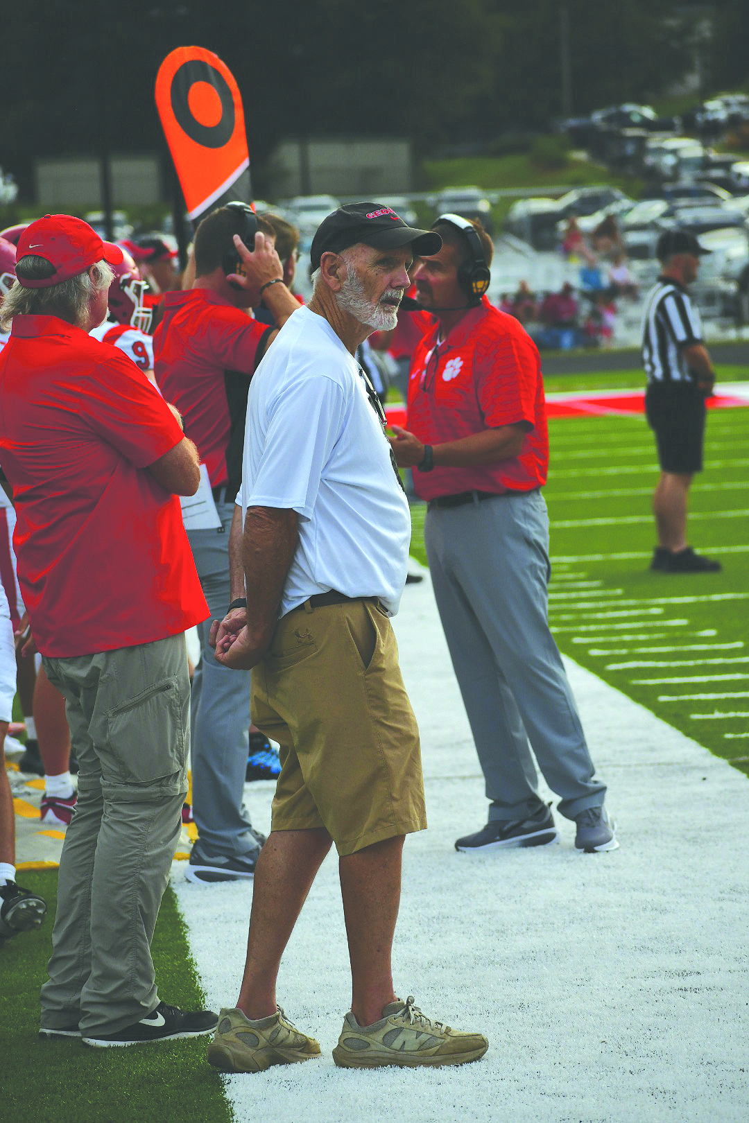 Enoch Autry/The Clayton Tribune. George Bobo watches the Rabun County Wildcats’ scrimmage game against Franklin (N.C.) High School on Aug. 11. Standing beside Bobo is David Rogers and the two have given years of dedication to the program. RCHS started its 2026 season on Aug. 28 with a win over visiting Metter with former Wildcat head coach Lee Shaw.