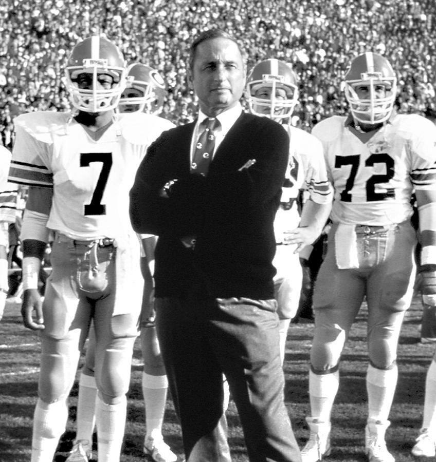 Photo courtesy University of Georgia. Photo courtesy University of Georgia.  Legend Vince Dooley was the head coach of the Georgia Bulldogs from 1964 to 1988 and served as UGA’s athletic director from 1979 to 2004. During his 25-year head coaching career, Dooley tallied a 201–77–10 record as his teams won six Southeastern Conference titles and the 1980 national championship. Following the 1980 season, Dooley was honored as college football’s “Coach of the Year” by numerous organizations. In 1994, Dooley was