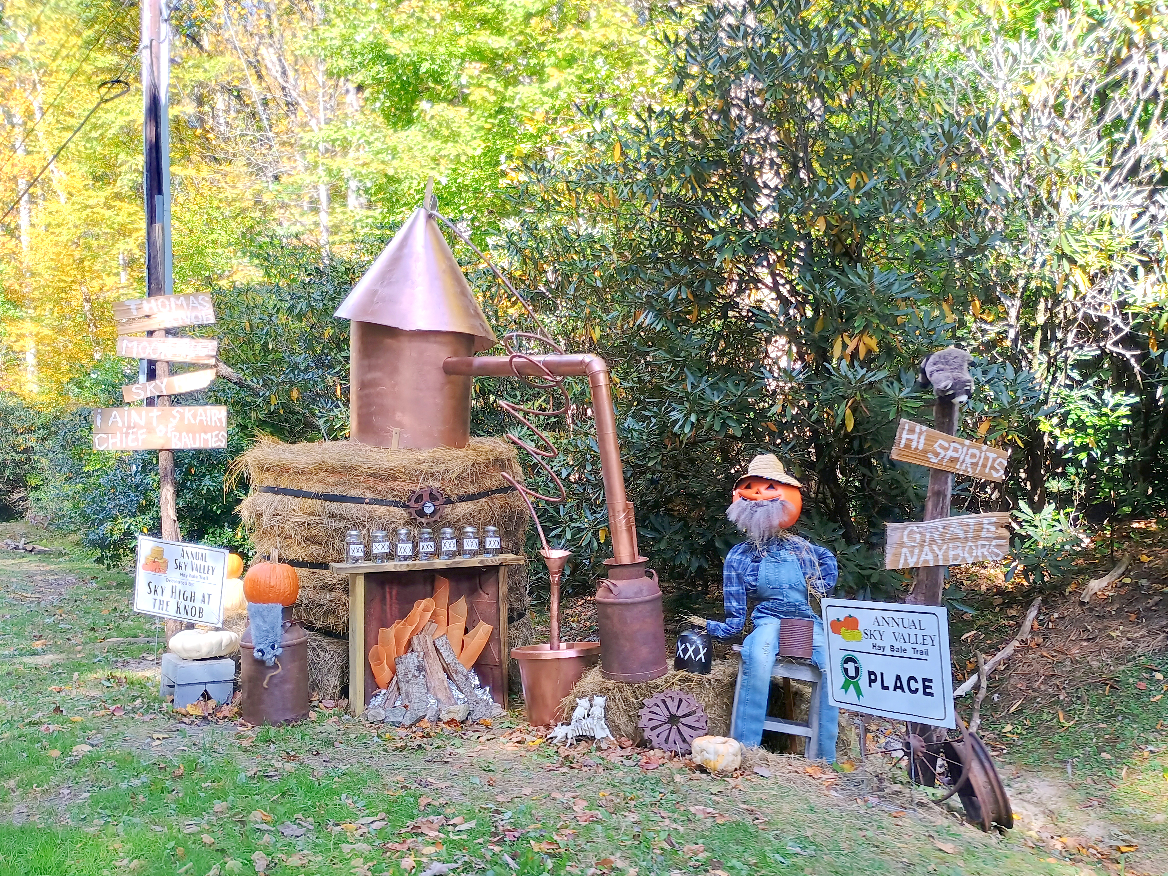 Megan Horn/The Clayton Tribune. The first place winner of the Sky Valley Hay Bale Trail was “Sky High at The Knob” for this hay bale that was decorated as a moonshine still.  The Sky Valley Fall Festival day was filled with plenty of fun.