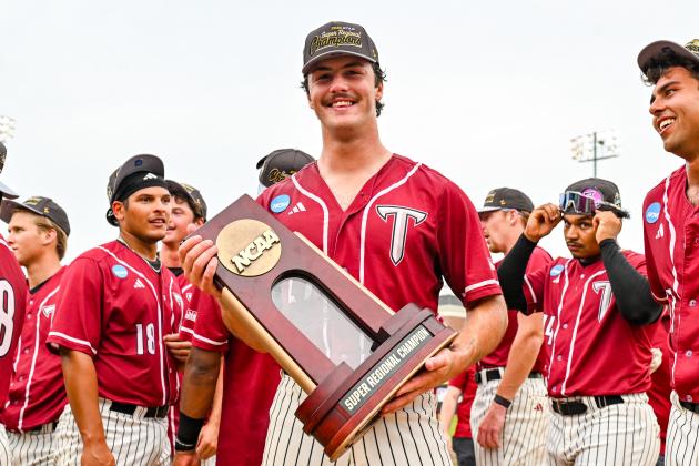 Aliza Chambers/Troy University. Rabun Gap alumnus Dylan Alonso holds the trophy after he and the Trojans won an NCAA Super Regional this postseason for the first time in program history. Following his best collegiate season, Alonso was selected in the 16th round of the MLB Draft by the Kansas City Royals. 