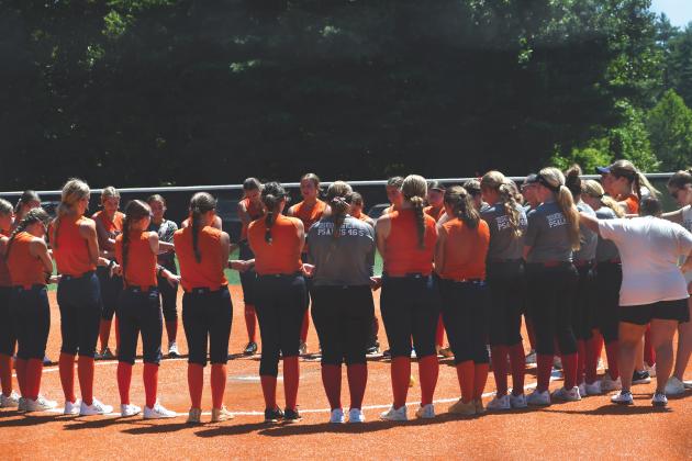 Wesley Branch/The Clayton Tribune. Rabun County and Habersham Central players gather to pray together after the teams completed their July 20 scrimmage at Rabun County High School. The Lady Cats are led by third-year head coach Jessica Evans.
