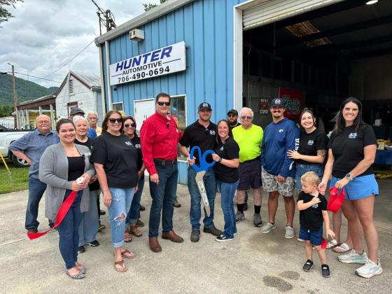 Photo courtesy of Forward Rabun/Rabun County Chamber of Commerce. The ribbon is cut for Hunter Automotive in Clayton for the business’ grand opening on July 10. 