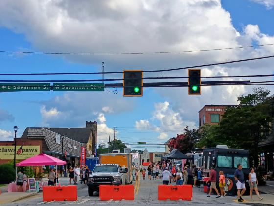 Megan Horn/The Clayton Tribune. Over 100 classic automobiles “cruised-in” to downtown Clayton on Saturday, Aug. 8, for the Block Party & Cruise In. Hundreds of people attended the family-friendly event that featured classic automobiles, food trucks, music and local shopping and dining.