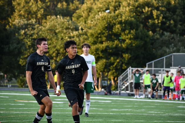 Photo by Wesley Branch/The Clayton Tribune. Rabun Gap’s Jose Luis Carrillo (center) celebrates after a goal on a penalty shot in Rabun Gap’s first game versus Christ School last season, which was canceled early and finished on Sept. 30, 2025.