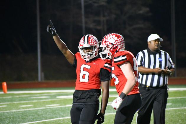 Wesley Branch/The Clayton Tribune. Rabun County’s JK Fruster (left) and Mack Williams celebrate after a sack by Fruster during the Wildcats’ second-round home playoff win over Berrien on Nov. 21, 2025. Fruster and Williams will headline the Wildcat defense this season. RCHS’s season opener is Aug. 28 at home.