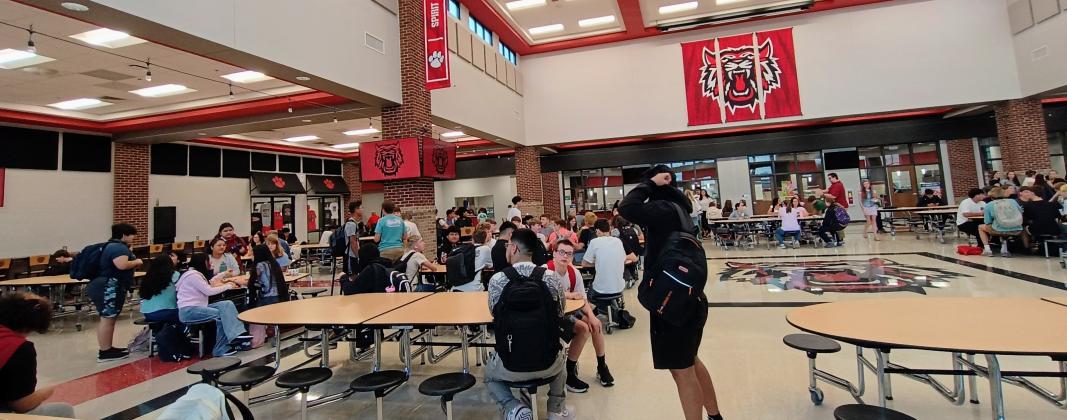 Megan Horn/The Clayton Tribune.  Rabun County middle and high school students mingle in the cafeteria on the first day of school Monday, Aug. 3. 