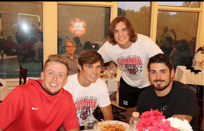 Photo courtesy Von Watts. From left, Braxton Hicks, Hoff Windham, Gunner Stockton and Mason Sprinkle pose for a photo during an episode of the “Fifth Quarter Show” at Mama G’s Italian Restaurant. The show was first held at Mama G’s before being moved to Wildcat Grill years later. 