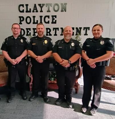 Megan Horn/The Clayton Tribune. The Clayton Police Department is committed to providing professional police service to both citizens and all who pass through the city. Pictured are Officer Jonathon Watts, Chief Kevin Marsteller, Terry Palmer and Sarah Chapman. Not pictured are Officers Delena Joedicke, Andy Beck and Jimmy Nations. 