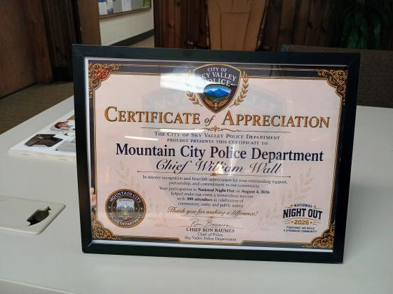 Megan Horn/The Clayton Tribune. The Sky Valley Police Department presented this Certificate of Appreciation to Mountain City Police Department Chief William Wall. 