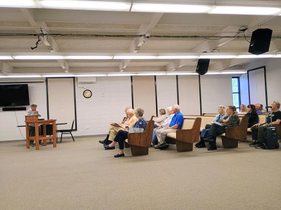Clayton resident Dee Daley, left, speaks on Tuesday, Sept. 29, during a 10 a.m. City of Clayton budget hearing regarding a proposed tax increase. Community members attended both the 10 a.m. and 6 p.m. hearings. The third and final public hearing is scheduled for Tuesday, Oct. 13 at 4:30 p.m. 