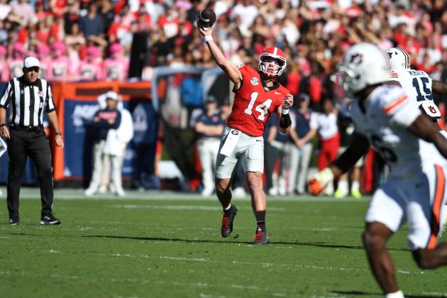 Keith Barlow/CNI News Service. Former Rabun County and current UGA quarterback Gunner Stockton throws downfield to a receiver in Georgia’s 27-24 loss to Auburn on Oct. 17. Stockton finished the game with 272 passing yards and two touchdowns but had three costly turnovers.