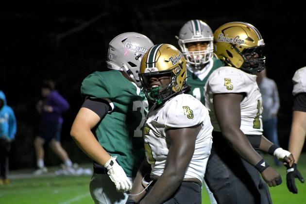 Wesley Branch/The Clayton Tribune. Rabun Gap defensive lineman Royce Djouguem celebrates after a tackle in the Eagles’ 28-6 win versus Christ School on Oct. 16. Djouguem had four total tackles and a sack in the win.