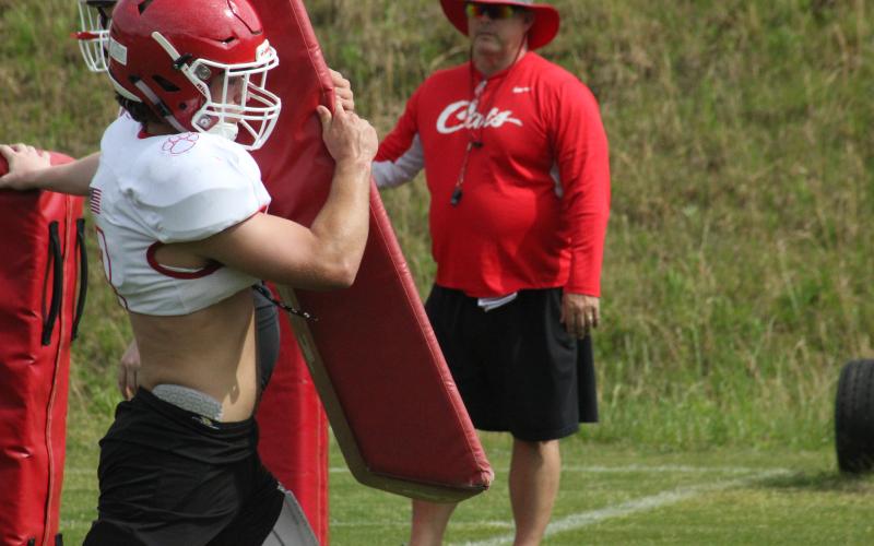Rabun County linebacker AJ Wheeler participates in a tackling drill during a practice in May. (Glendon Poe/The Clayton Tribune)