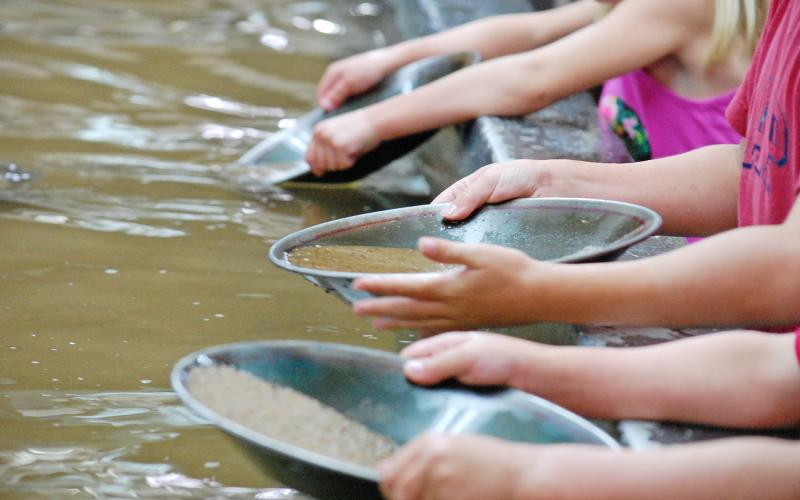 Miners young and old can strike it rich every day at one of Dahlonega’s mines with gold panning. Photo/John Bynum