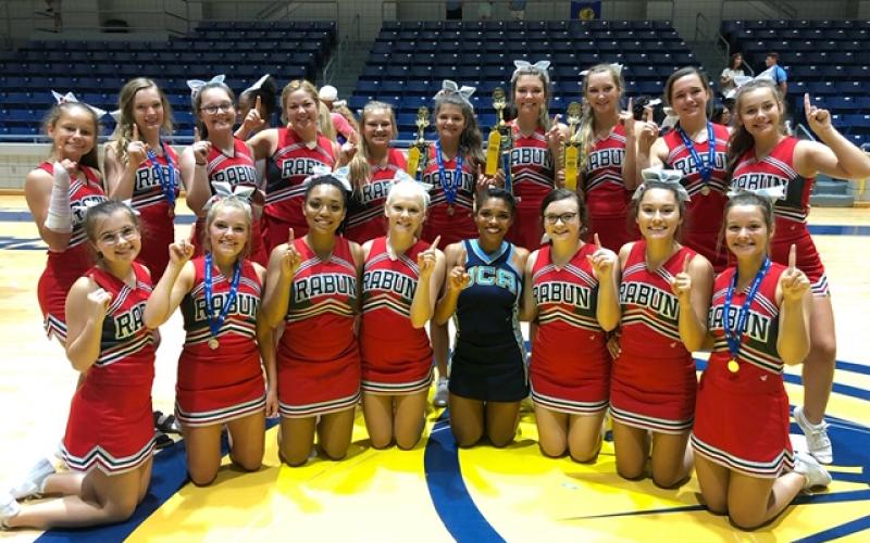 Rabun County cheerleaders are, in back, from left, Rainny Patterson, Kasten Weems, Savanna Sullivan, Cassidy Richardson, Brianna Henslee, Miya Stewart, Faith Cofield, Carley Smith, Willow Fisher, Laurel Justus; in front, from left, are Ayla Jarrard, Jaycee Weber, Keianna Owens, Haley Hunt, Jailah Zanders (Universal Cheerleaders Association), Elizabeth Scruggs, Josie Darnell and Maci Varnadoe. (Submitted Photo)