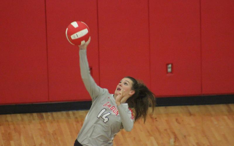 Rabun County’s Gracie Deetz serves against Lumpkin County at Ken Byrd Court on Tuesday night.