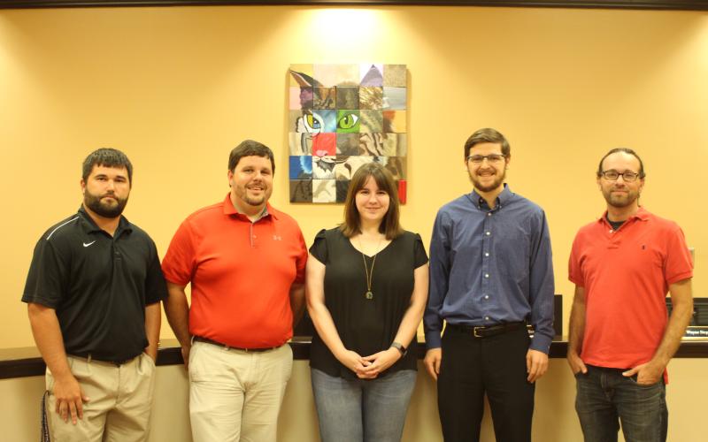 Megan Broome/The Clayton Tribune. Wesley Satterfield, left, Eric Dean, Daven Vandenberg, Caleb Cole and Bryant Tench are new teachers at Rabun County High School.