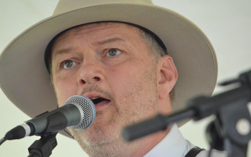 Wayne Knuckles/The Clayton Tribune. Nick Chandler, who leads Nick Chandler and Delivery, takes the stage Friday at the Dillard Bluegrass Festival.