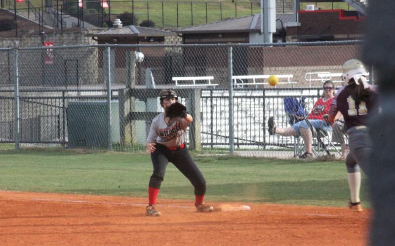 Rabun County's Isabella Green eyes a throw to first base during a game against Dawson at Rabun County High School in Tiger last Thursday. (Glendon Poe/The Clayton Tribune)
