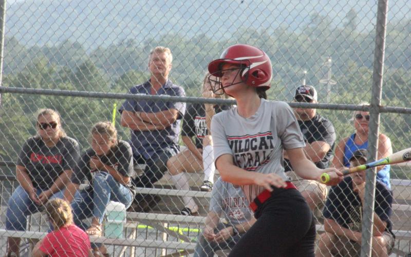 Rabun County’s Sarah Sprinkle watches her hit during a game against Dawson at Rabun County High School in Tiger last Thursday. (Glendon Poe/The Clayton Tribune)