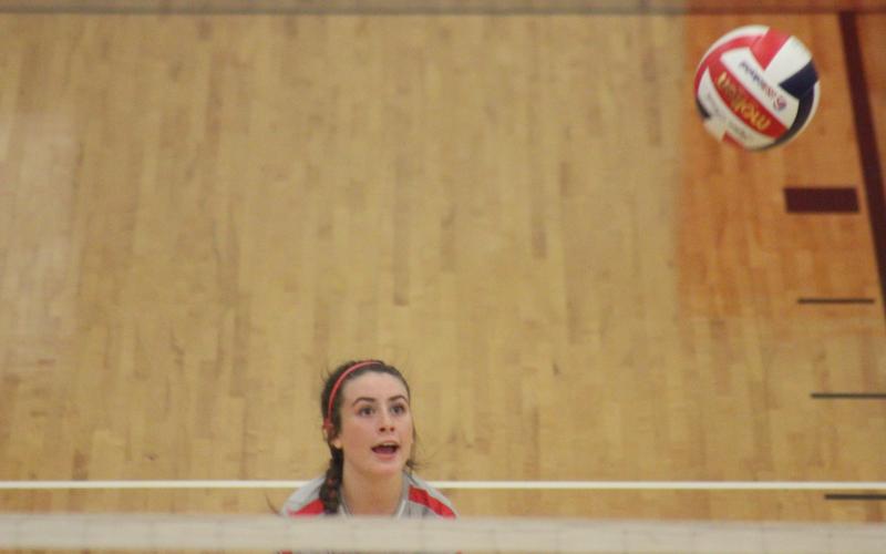 Rabun County’s Abbye Carver watches her shot fly across the net during a match against Dade County in the quarterfinal round of the GHSA Class A/AA-Public state playoffs at Ken Byrd Court in Tiger last Saturday afternoon. (Glendon Poe/The Clayton Tribune)