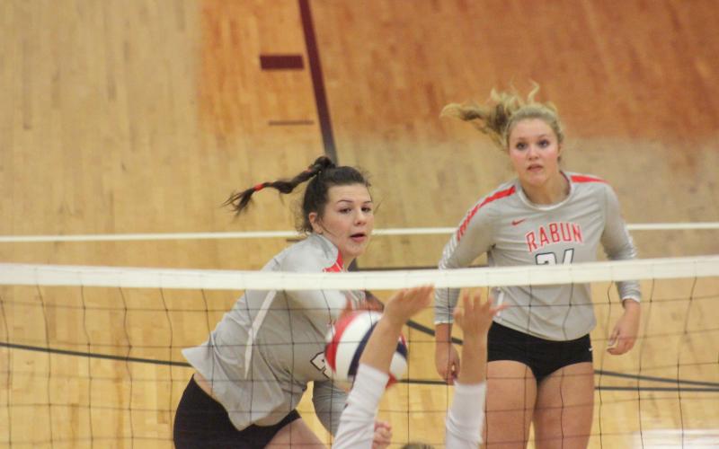 Rabun County’s Destiny Deetz, left, attacks Dade County while teammate Beth Payne watches during the quarterfinal round of the GHSA Class A/AA-Public state playoffs at Ken Byrd Court in Tiger last Saturday afternoon. (Glendon Poe/The Clayton Tribune)